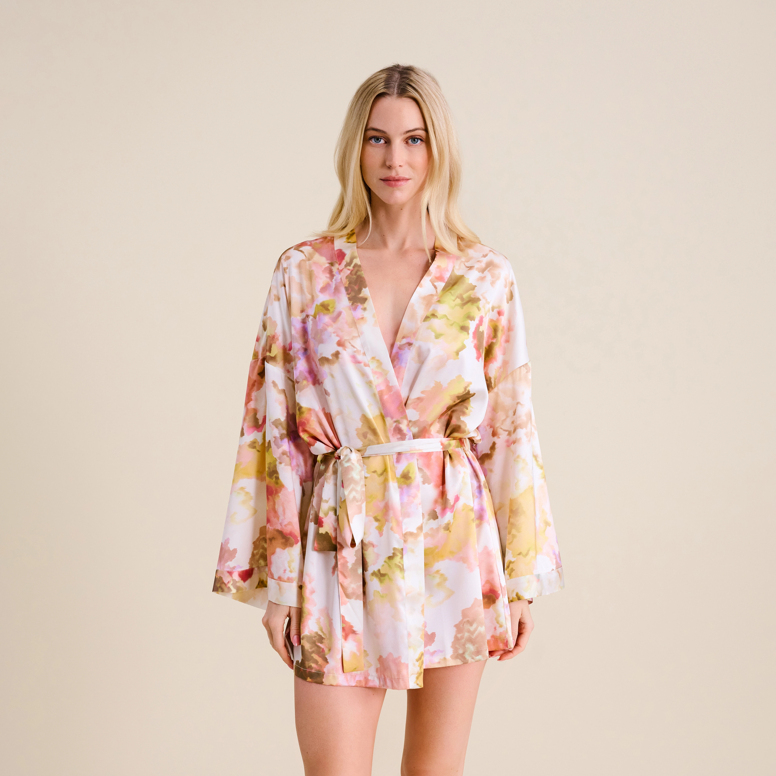 Amaya Mantel in rosa